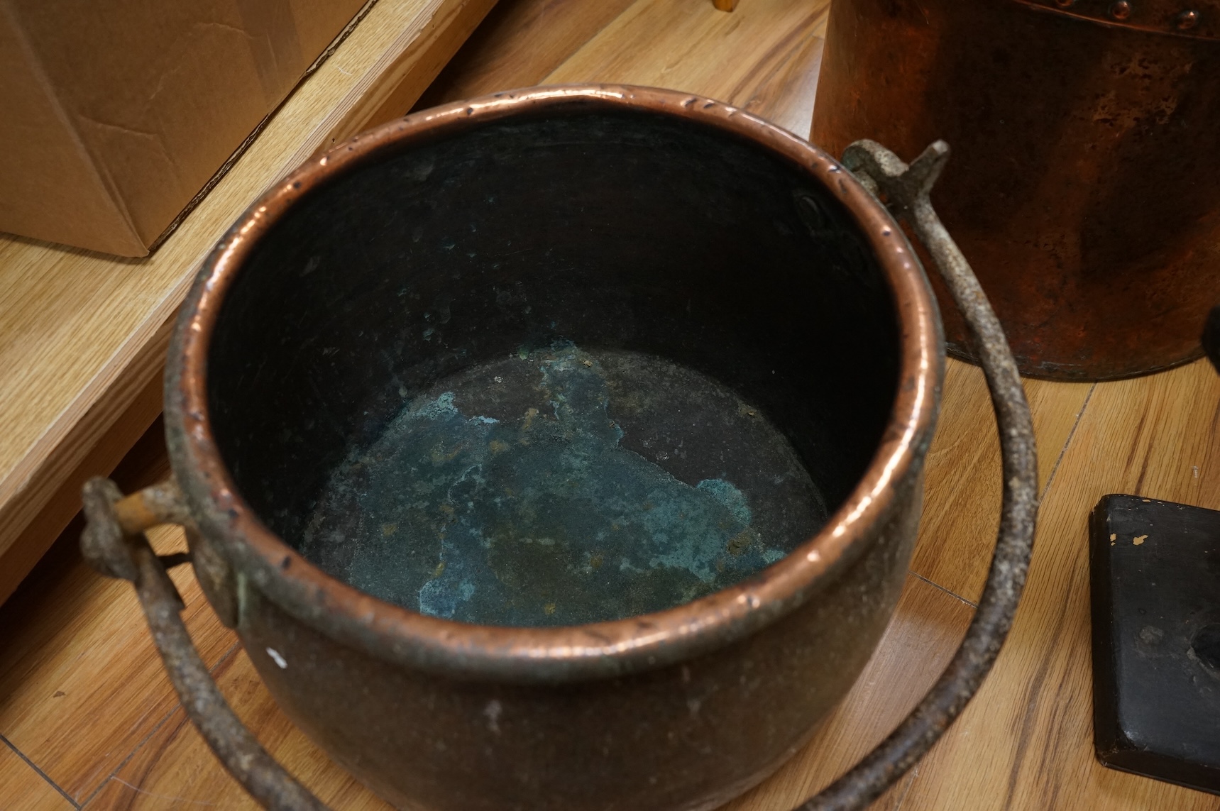 Two copper vessels and a plaster model of a horse